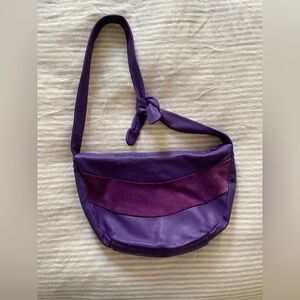 Purple knot shoulder bag